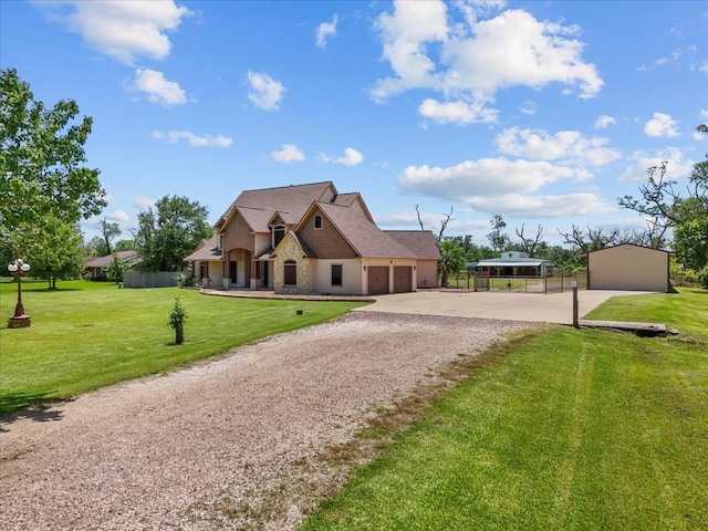 1273 County Road 201a, Angleton, TX 77515 - french provincial home with driveway, an attached garage, a front yard, and stone siding