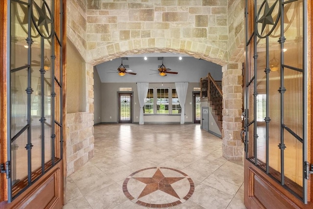 1273 County Road 201a, Angleton, TX 77515 - entrance foyer featuring ceiling fan, stairs, and light tile patterned flooring