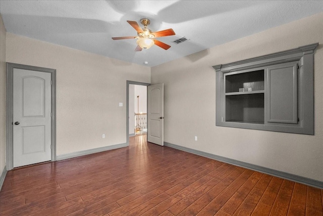 1273 County Road 201a, Angleton, TX 77515 - empty room with ceiling fan and wood finished floors