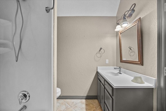 1273 County Road 201a, Angleton, TX 77515 - bathroom with vanity, tile patterned floors, and a textured wall