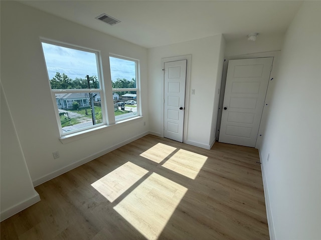 8601 Wileyvale Rd, Houston, TX 77016 - unfurnished bedroom with wood finished floors and baseboards