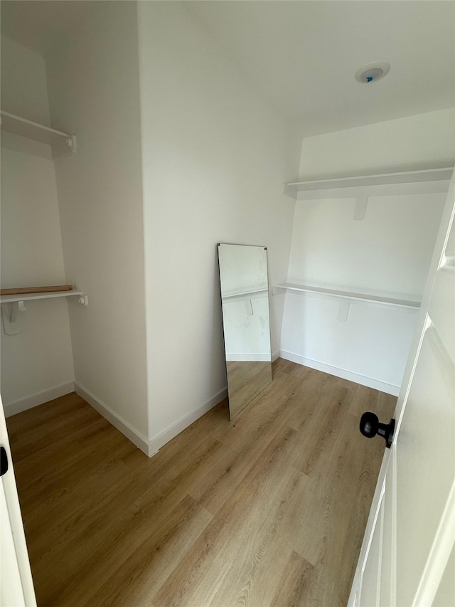8601 Wileyvale Rd, Houston, TX 77016 - spacious closet with wood finished floors