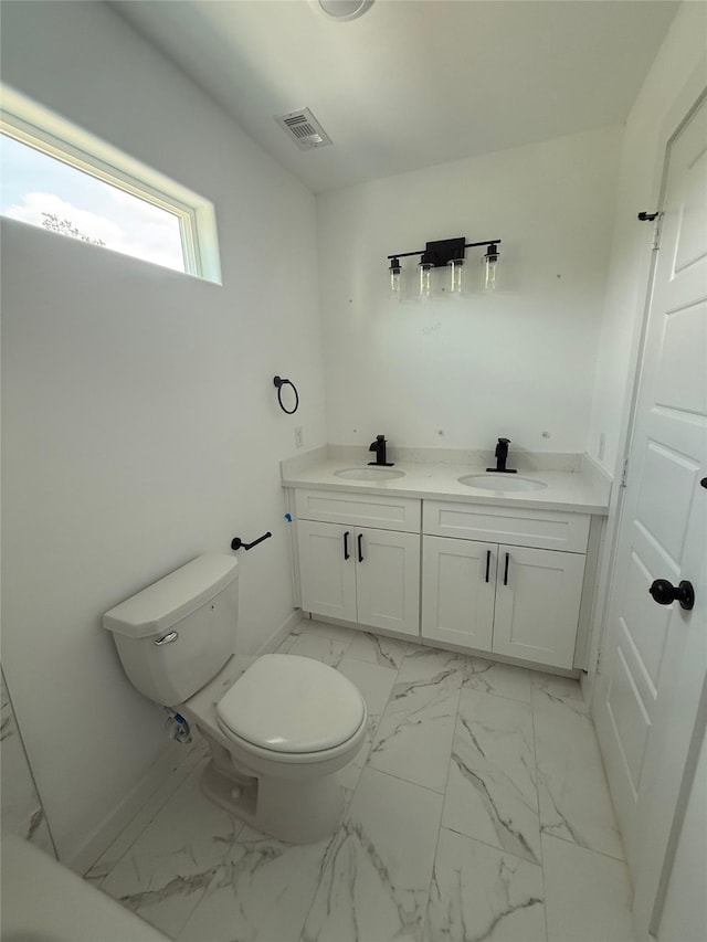 8601 Wileyvale Rd, Houston, TX 77016 - bathroom with marble finish flooring and double vanity