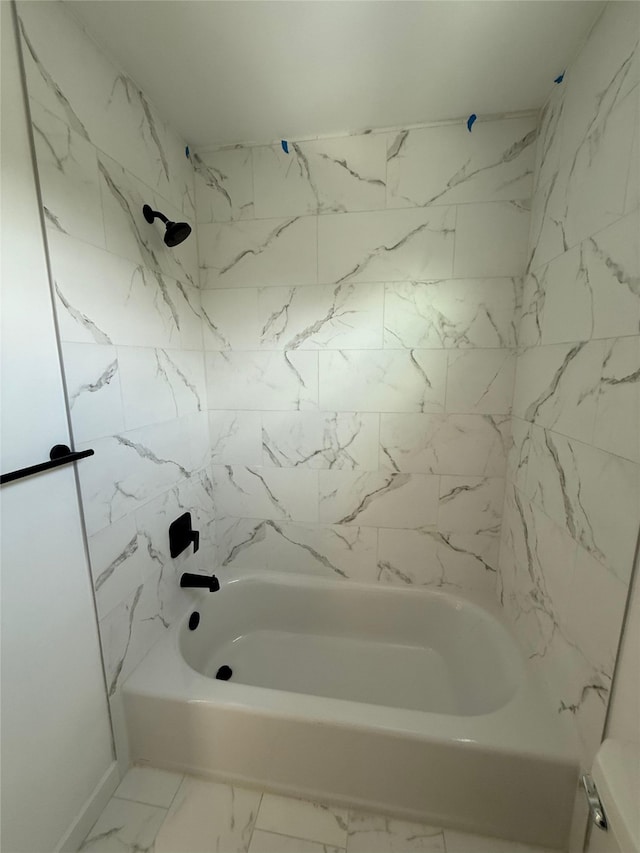 8601 Wileyvale Rd, Houston, TX 77016 - full bathroom with bathtub / shower combination and marble finish flooring