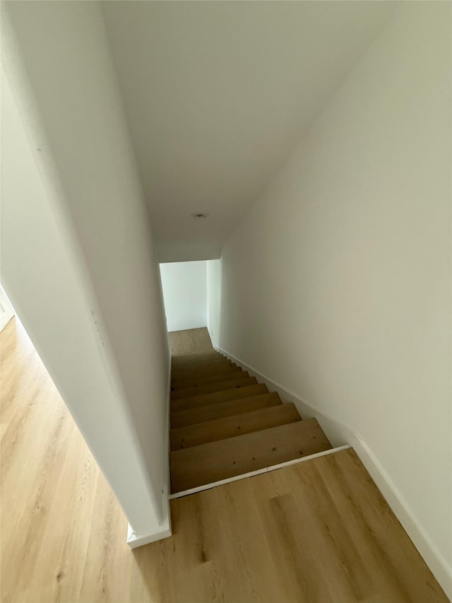 8601 Wileyvale Rd, Houston, TX 77016 - staircase with wood finished floors and baseboards
