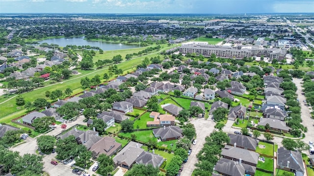 12005 Green Falls Dr, Pearland, TX 77584 - aerial view of property and surrounding area with a nearby body of water and nearby suburban area