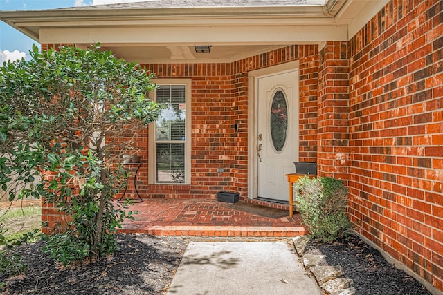 12005 Green Falls Dr, Pearland, TX 77584 - view of exterior entry featuring brick siding