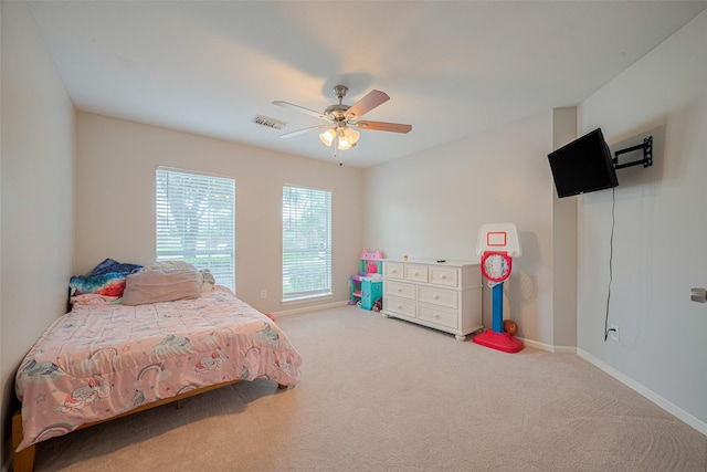 12005 Green Falls Dr, Pearland, TX 77584 - carpeted bedroom featuring ceiling fan and baseboards