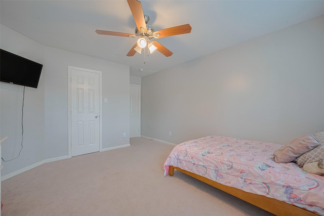 12005 Green Falls Dr, Pearland, TX 77584 - bedroom featuring light carpet and a ceiling fan