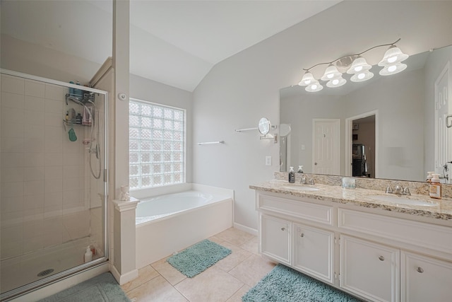12005 Green Falls Dr, Pearland, TX 77584 - full bath with a bath, a stall shower, double vanity, tile patterned flooring, and vaulted ceiling