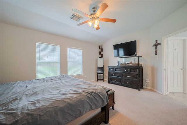 12005 Green Falls Dr, Pearland, TX 77584 - bedroom featuring light colored carpet, lofted ceiling, and a ceiling fan