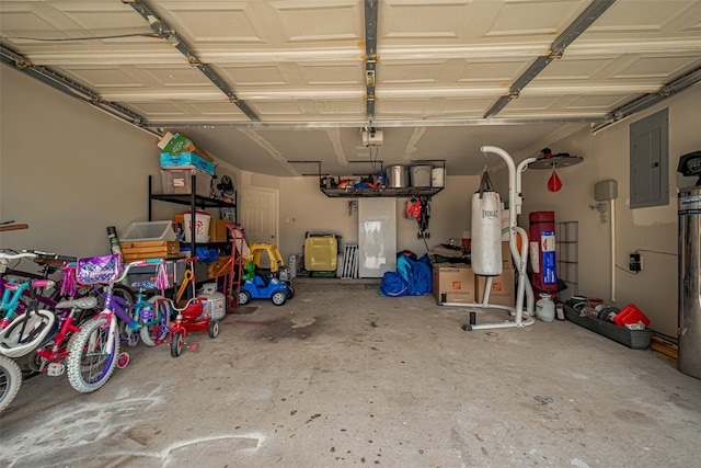 12005 Green Falls Dr, Pearland, TX 77584 - garage featuring electric panel and a garage door opener
