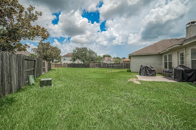 12005 Green Falls Dr, Pearland, TX 77584 - fenced backyard featuring a patio