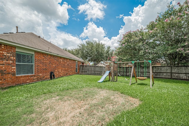 12005 Green Falls Dr, Pearland, TX 77584 - fenced backyard featuring a playground