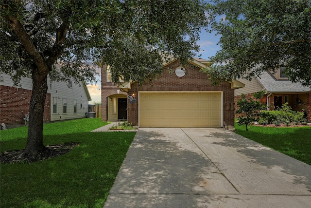 1019 Sawgrass Ridge Ln, Houston, TX 77073 - obstructed view of property featuring brick siding, driveway, a garage, and a front lawn