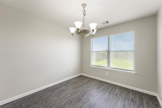 1019 Sawgrass Ridge Ln, Houston, TX 77073 - unfurnished room featuring a chandelier and dark wood-type flooring