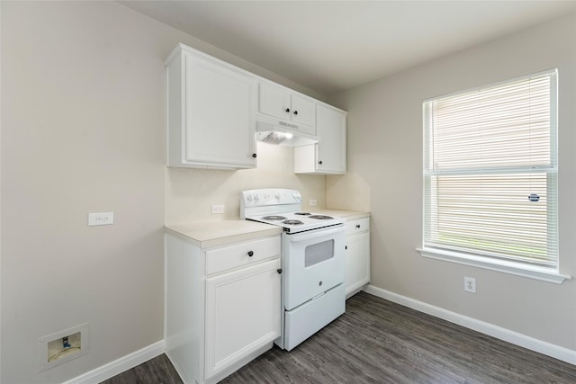 1019 Sawgrass Ridge Ln, Houston, TX 77073 - kitchen with white electric range oven, under cabinet range hood, dark wood-style flooring, light countertops, and white cabinetry