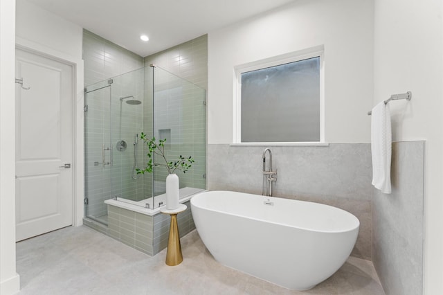 4403 Feagan, Houston, TX 77007 - full bath with tile walls, a freestanding tub, and a shower stall