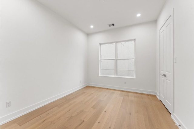 4403 Feagan, Houston, TX 77007 - unfurnished bedroom featuring light wood-type flooring and recessed lighting