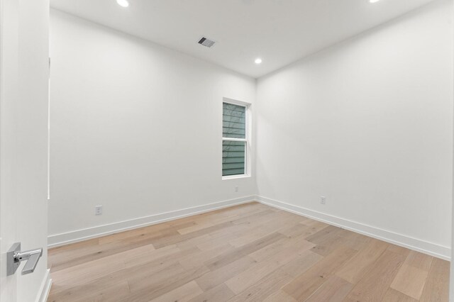 4403 Feagan, Houston, TX 77007 - empty room with light wood-type flooring and recessed lighting