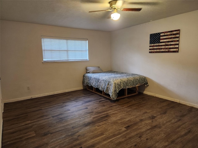 324 E Hunting Tower Run, Montgomery, TX 77316 - bedroom featuring wood finished floors and a ceiling fan