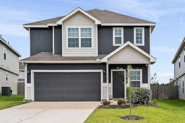 2580 Westslope Dr, Conroe, TX 77384 - traditional-style house featuring board and batten siding, a garage, concrete driveway, and a shingled roof