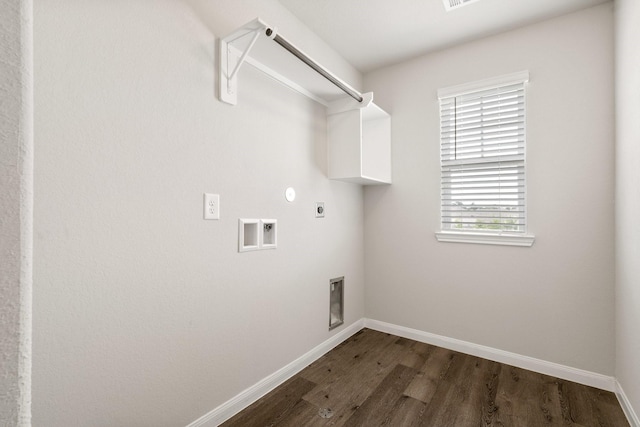 2580 Westslope Dr, Conroe, TX 77384 - washroom featuring hookup for an electric dryer, hookup for a gas dryer, dark wood-style flooring, and washer hookup