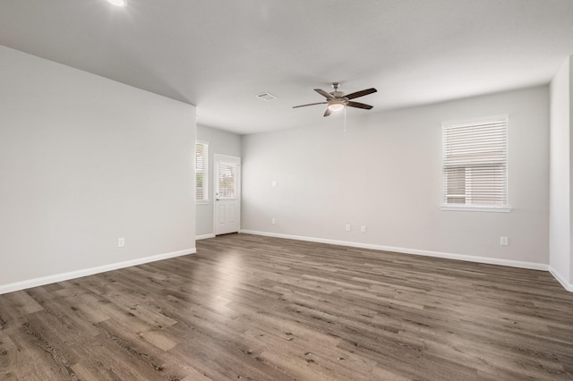 2580 Westslope Dr, Conroe, TX 77384 - spare room with a ceiling fan and wood finished floors