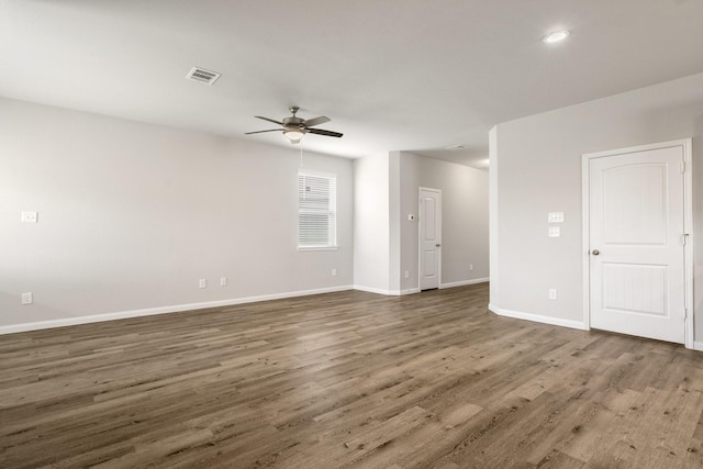 2580 Westslope Dr, Conroe, TX 77384 - empty room featuring ceiling fan, wood finished floors, and recessed lighting