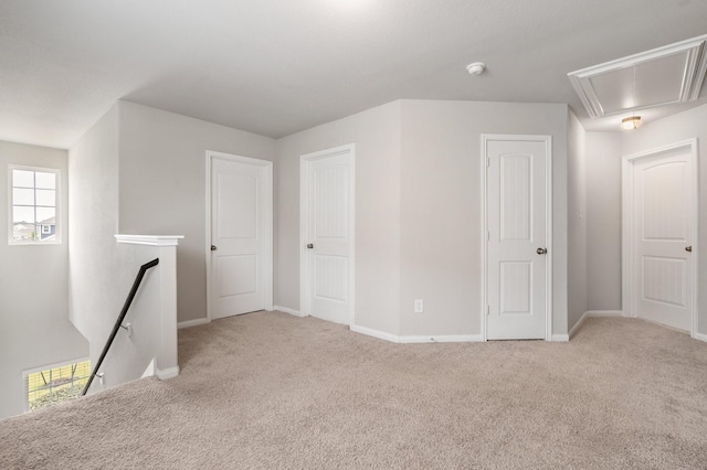 2580 Westslope Dr, Conroe, TX 77384 - bonus room featuring attic access, carpet flooring, and plenty of natural light