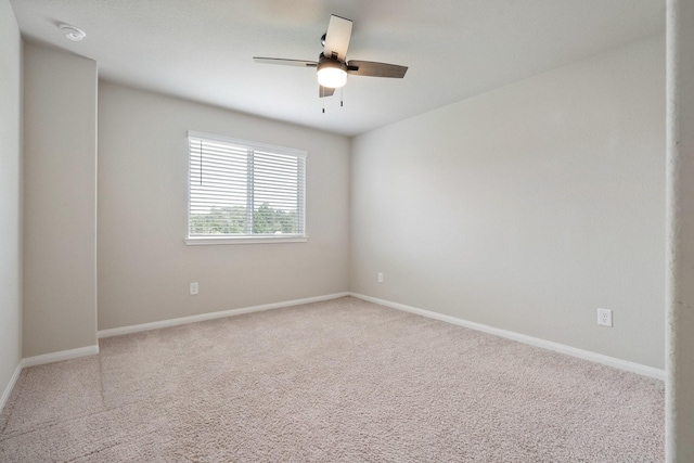 2580 Westslope Dr, Conroe, TX 77384 - carpeted spare room featuring a ceiling fan and a smoke detector