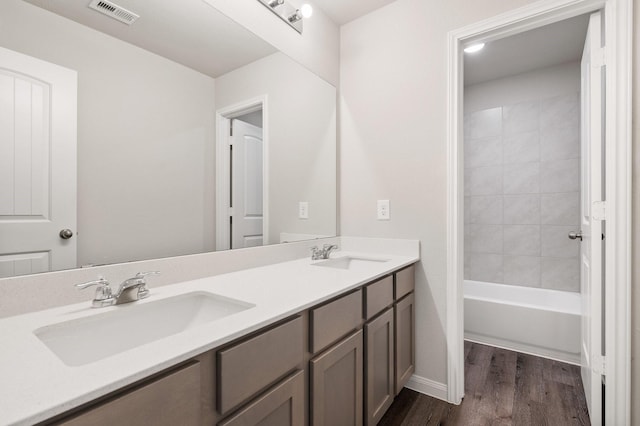 2580 Westslope Dr, Conroe, TX 77384 - full bath with double vanity and wood finished floors