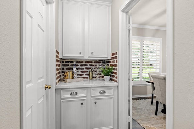 14427 Wickhurst Pl, Cypress, TX 77429 - bar area featuring ornamental molding
