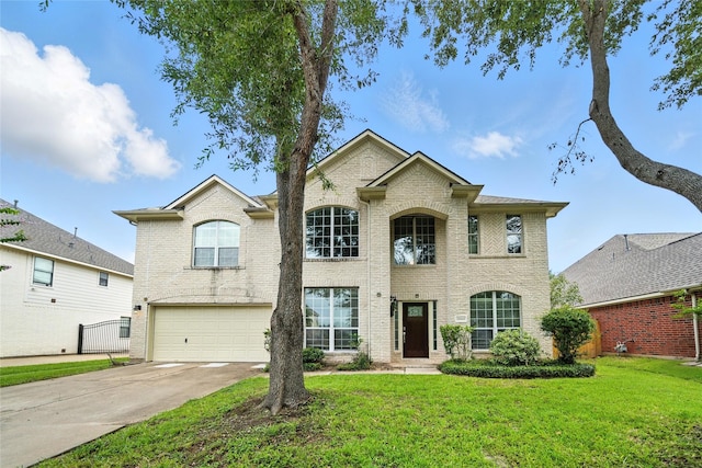21142 Granite Trail Ln, Richmond, TX 77407 - view of front facade featuring a garage, a front yard, driveway, and brick siding
