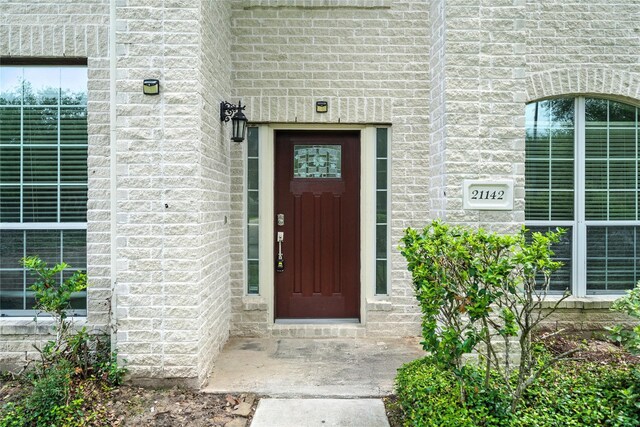 21142 Granite Trail Ln, Richmond, TX 77407 - property entrance featuring stone siding