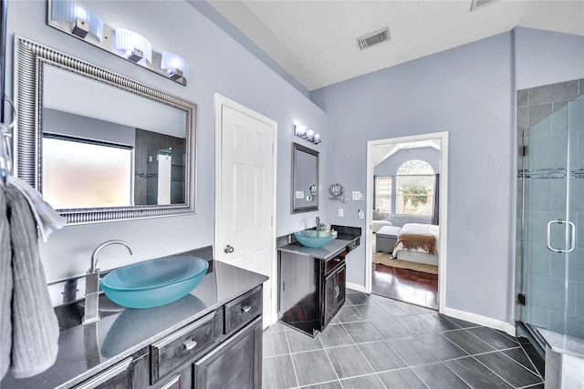 21142 Granite Trail Ln, Richmond, TX 77407 - ensuite bathroom with a shower stall, two vanities, and tile patterned flooring