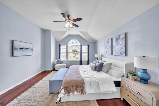 21142 Granite Trail Ln, Richmond, TX 77407 - bedroom featuring dark wood-style floors, vaulted ceiling, and a ceiling fan