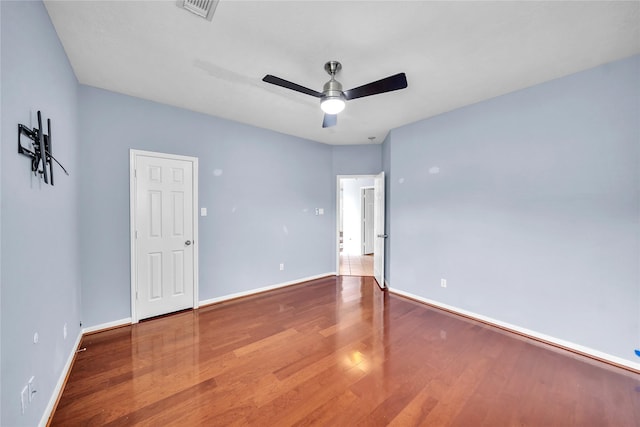 21142 Granite Trail Ln, Richmond, TX 77407 - empty room featuring wood finished floors and ceiling fan