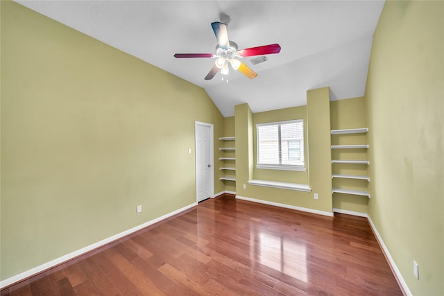21142 Granite Trail Ln, Richmond, TX 77407 - unfurnished room featuring wood finished floors, lofted ceiling, a ceiling fan, and built in features