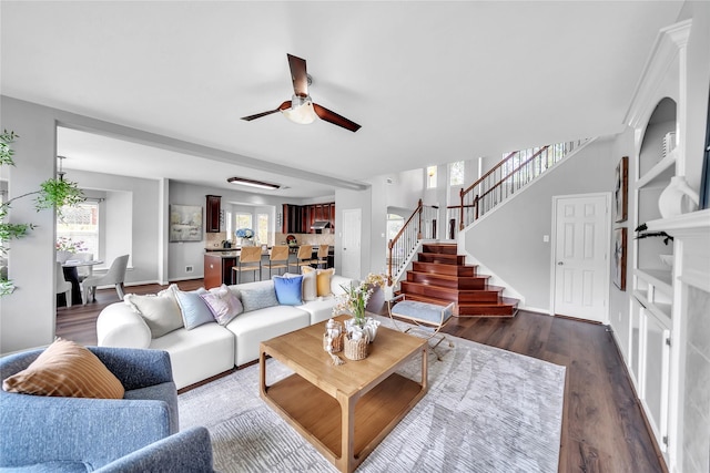 21142 Granite Trail Ln, Richmond, TX 77407 - living room featuring stairway, ceiling fan, and dark wood-type flooring