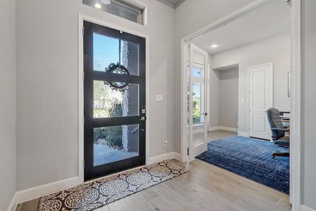 29726 Smoky Ridge Rd, Fulshear, TX 77441 - entrance foyer with wood finished floors and french doors