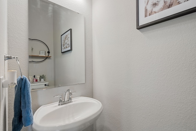 29726 Smoky Ridge Rd, Fulshear, TX 77441 - bathroom with a sink and a textured wall