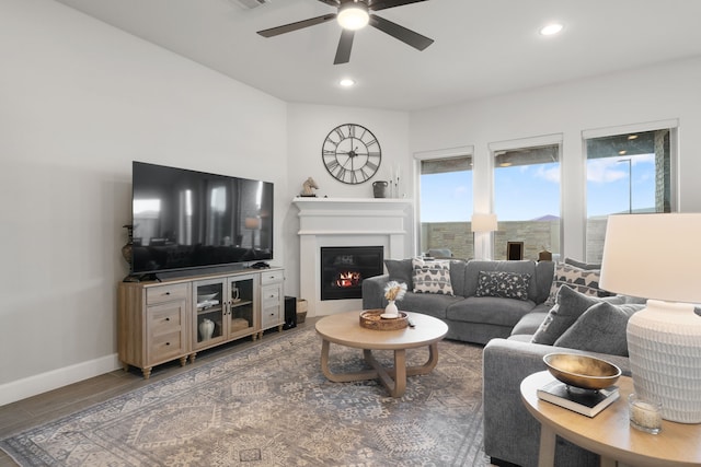 29726 Smoky Ridge Rd, Fulshear, TX 77441 - living room featuring a glass covered fireplace, a ceiling fan, and recessed lighting