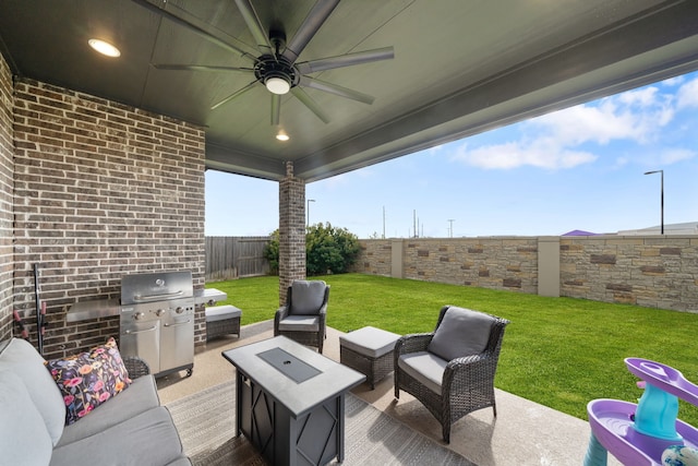 29726 Smoky Ridge Rd, Fulshear, TX 77441 - fenced backyard with an outdoor living space, ceiling fan, grilling area, and a patio area