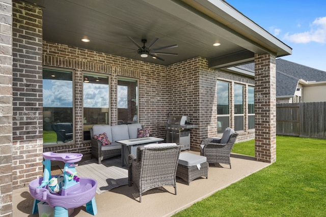 29726 Smoky Ridge Rd, Fulshear, TX 77441 - view of patio / terrace with grilling area, ceiling fan, and outdoor lounge area