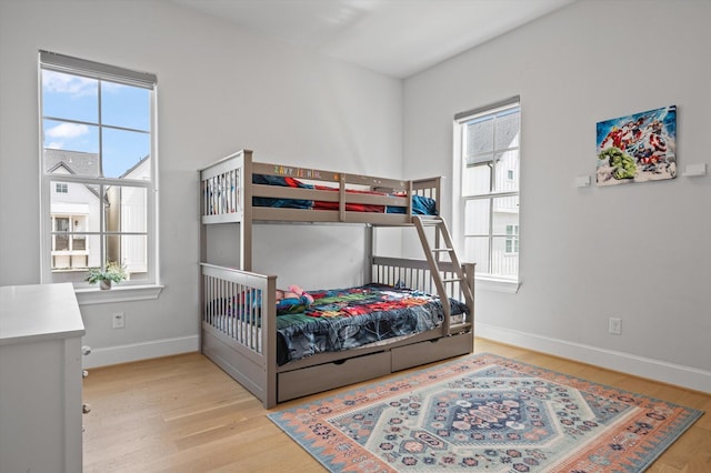 1217 Timbergrove Acres St, Houston, TX 77008 - bedroom featuring multiple windows and wood finished floors