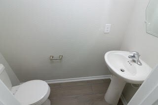5018 Brewcastle Ln, Katy, TX 77493 - half bath with baseboards and toilet