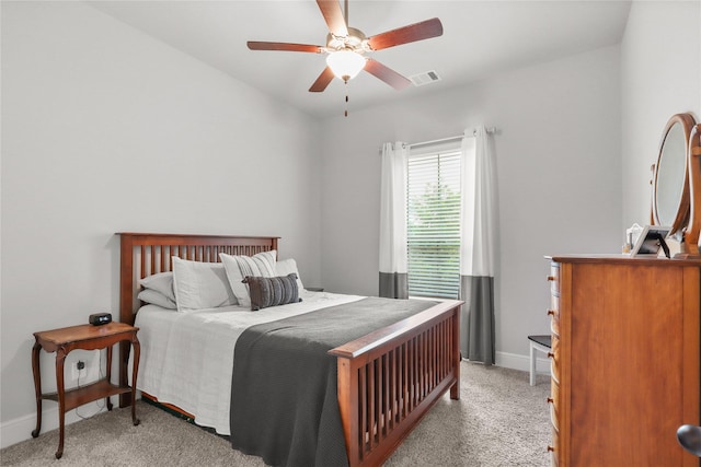 4802 Wagtail Way Ln, League City, TX 77573 - bedroom with light carpet and a ceiling fan