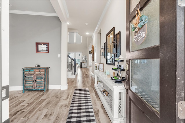 4802 Wagtail Way Ln, League City, TX 77573 - hall featuring crown molding, light wood-style floors, stairs, and recessed lighting