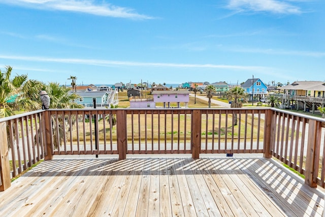 1214 Fort Velasco Dr, Surfside Beach, TX 77541 - wooden deck with a residential view